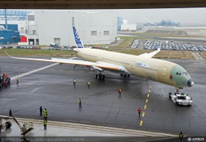 Now showing its completed wings, the new Airbus A350XWB has moved to its next phase of ground testing. The aircraft is structurally complete and shows the installed winglets, belly fairing panels, main landing gear doors.