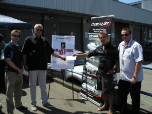 (left to right) Rob Favel, Pacific Coastal Airlines; Kevin Boothroyd, Pacific Coastal Airlines; Lyle Gibson, Cargojet YVR; and Shawn Warneboldt, Pacific Coastal Airlines. Pacific Coastal Airlines provided return tickets to Victoria worth $716 to be used as a raffle prize.